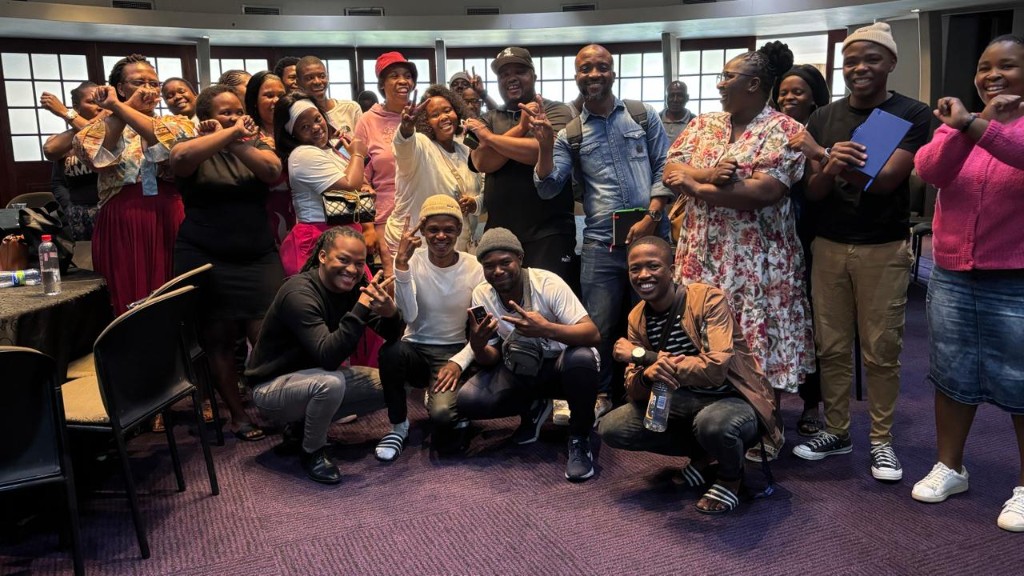 Traders celebrating at a Traders Confidence event